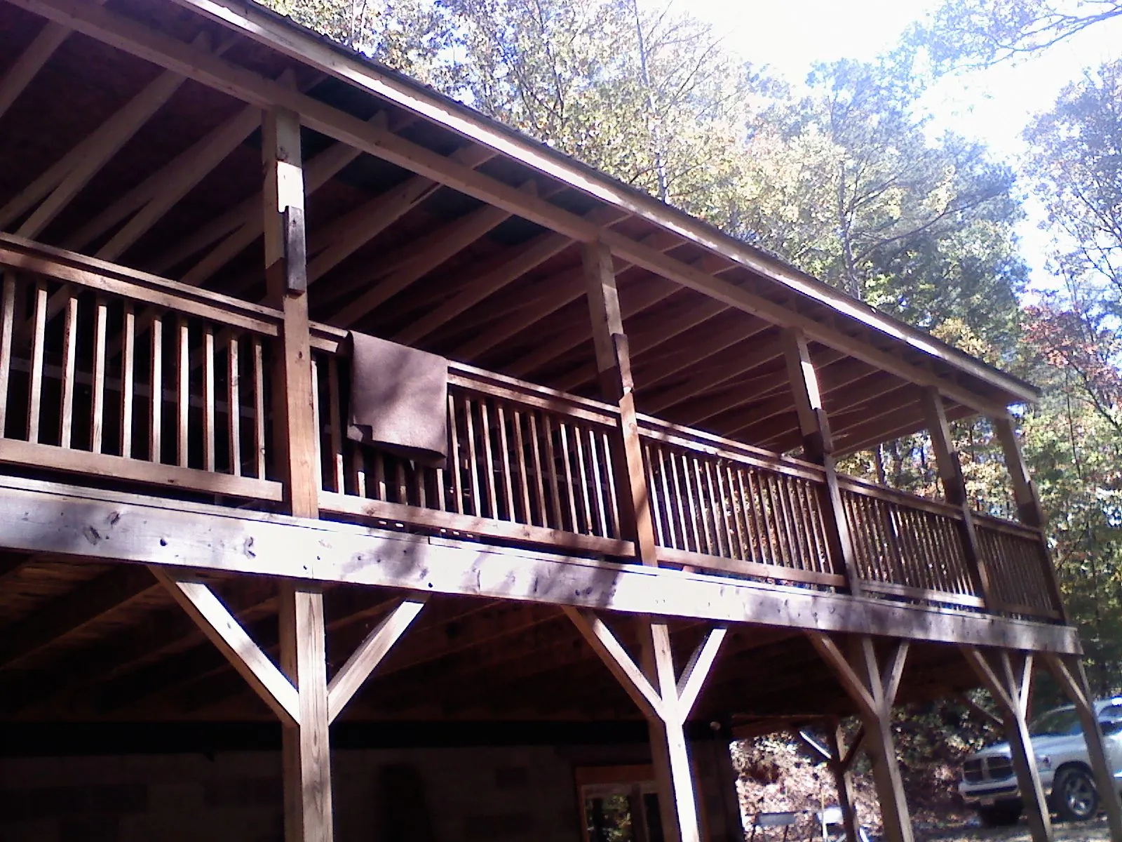 Timber framing under a new elevated porch and deck — Roof Leak Repair in Winterset by Roofing Brothers